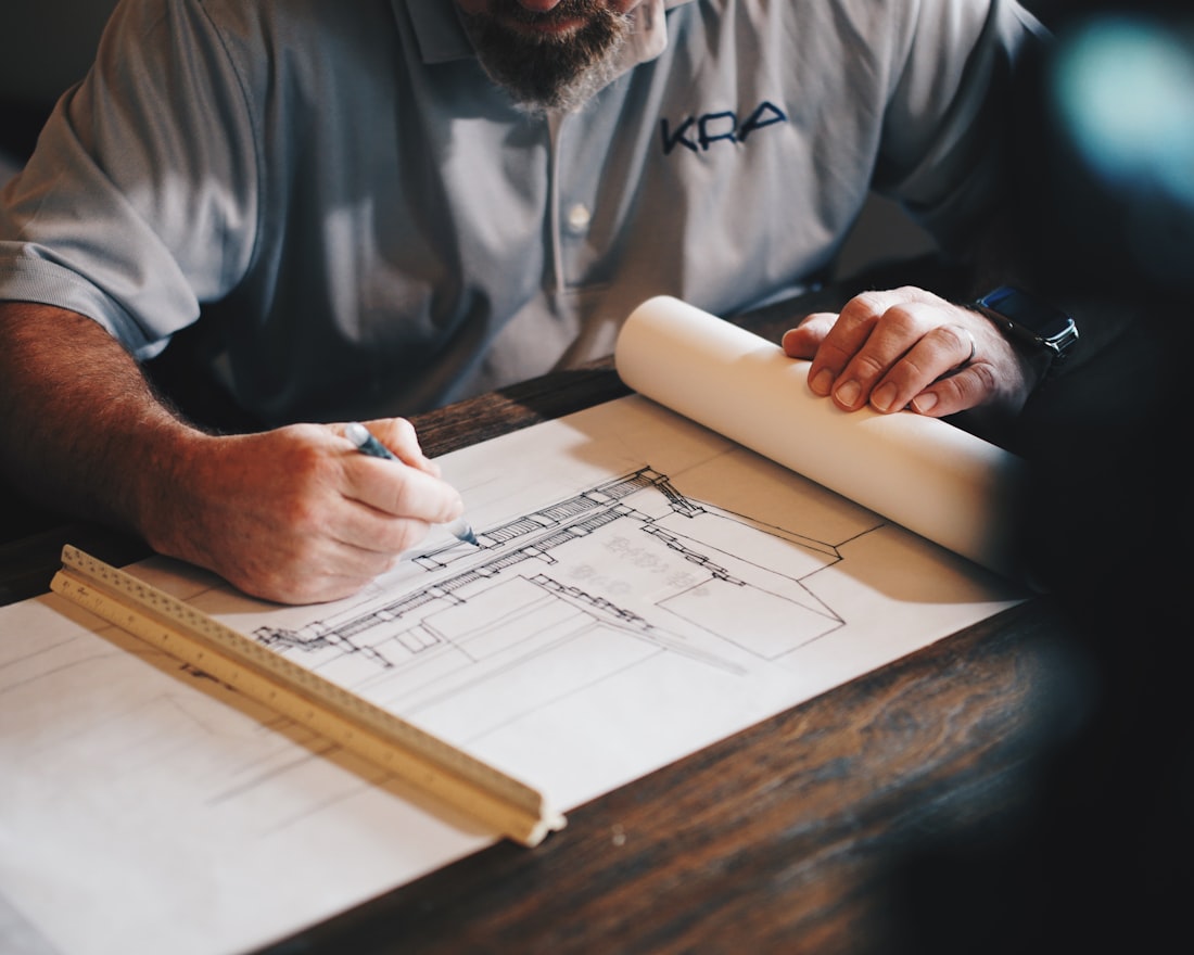 Hi-Construct engineer reviewing structural drawings